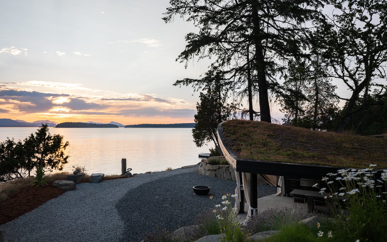 Salt Spring Island pavilion at sunset, the roof opening toward the water